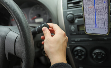 Car driving handle with hand: a symbol of control, independence, mobility, and the freedom of the...