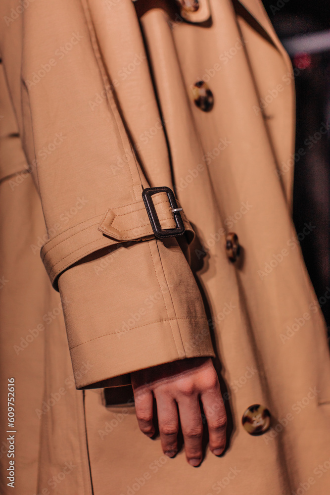 Sticker details of autumn brown classy coat. unisex street style fashion cloth concept