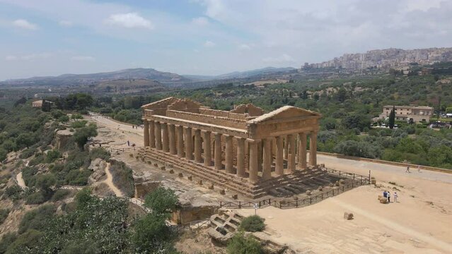 flying clockwise around Temple of Concordia in Valley of the Temples in Agrigento Sicily