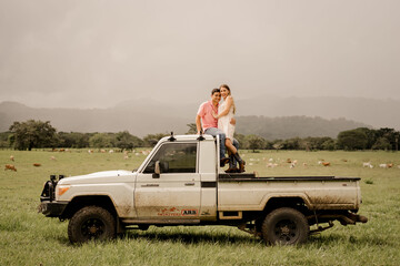 In love Couple, with 4x4 car © Arianne
