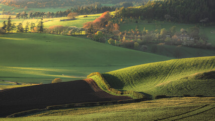 Scenic landscape view of rollimg hills and pastoral countryside farmland in Moonzie near Cupar in Fife, Scotland, UK.