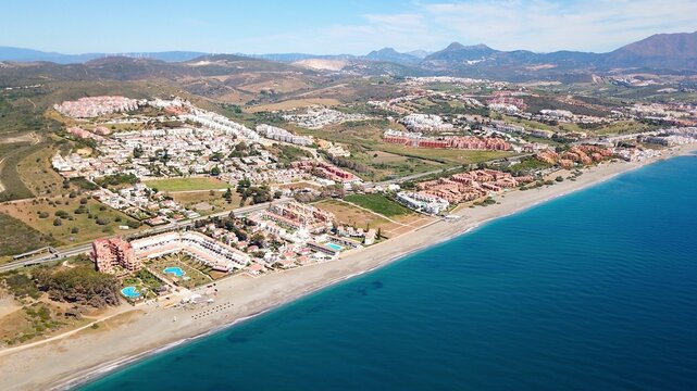 aerial view towards Manilva coast holiday homes and beach on the Costa del Sol as well as Duquesa Port on the Mediterranean Sea, Andalusia, Estepona, Marbella, Manilva, Malaga, Spain