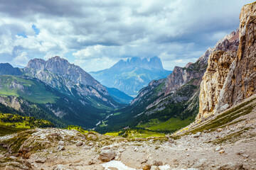 landscape with mountains, clouds and rocks