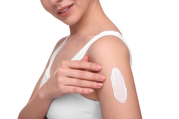 Obraz na płótnie Canvas Woman with smear of body cream on her arm against white background, closeup