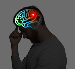 Amnesia. Thoughtful man with illustration of brain on grey background