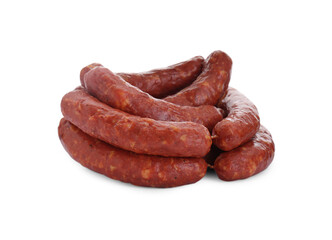 Many fresh raw sausages isolated on white. Meat product