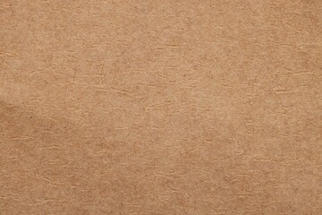 Texture of beige paper sheet as background, top view
