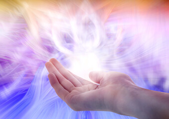 Aura phenomena. Woman with flows of energy around her hand against color background, closeup