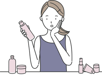 肌の手入れをする女性とスキンケア製品