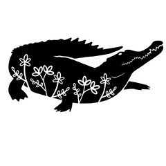 Crocodile. Vector animal with floral element. Illustration. Animal silhouette. Black isolated silhouette