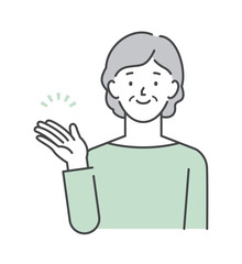 案内・紹介ポーズでおすすめするシニア女性