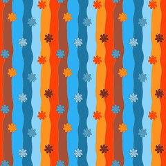 Multicolored flowers on a bright wavy striped background. Seamless pattern.