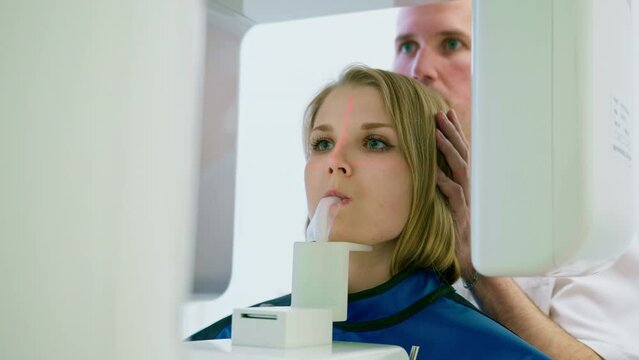 Scanning of the dental jaw The patient undergoes a procedure of panoramic radiography of the oral cavity in modern dentistry