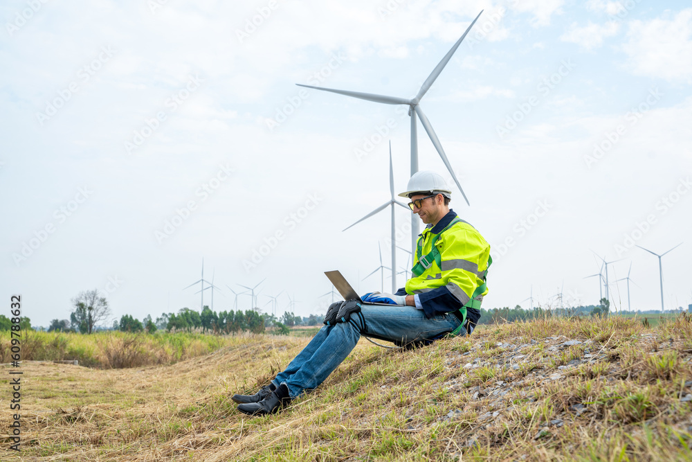 Poster group of engineers planning discuss project ann working in wind turbine farm,sustainable future.