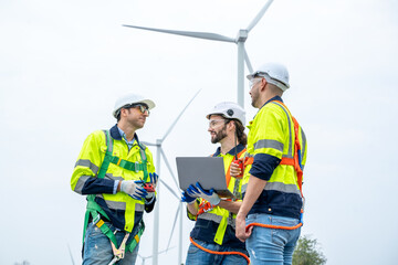 Technician engineers inspection work in wind turbine power generator station,Wind turbine operations that transform wind energy into electrical electricity.