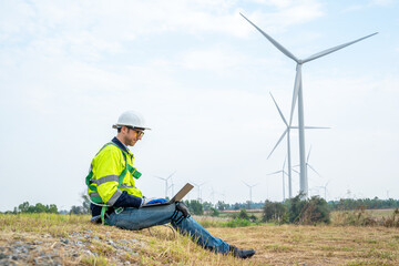 Technician engineer inspection work at wind turbine electricity industrial,Concept of alternative energy and service.