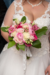 Obraz na płótnie Canvas The beautiful pink bride's bouquet
