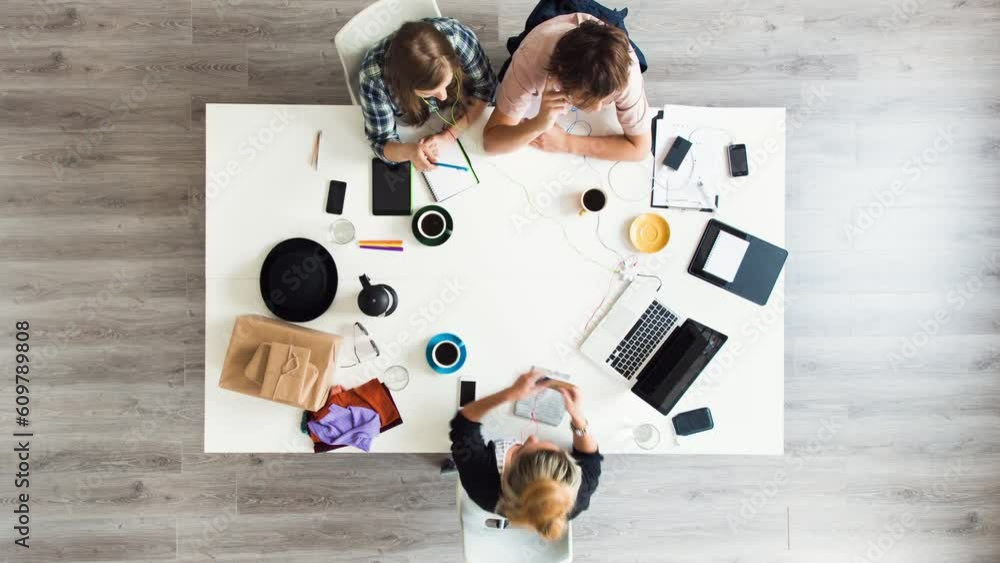 Poster Planning, teamwork and top view of business people in meeting for creative, designer and brainstorming. Collaboration, time lapse and illustration with employees in startup for project management