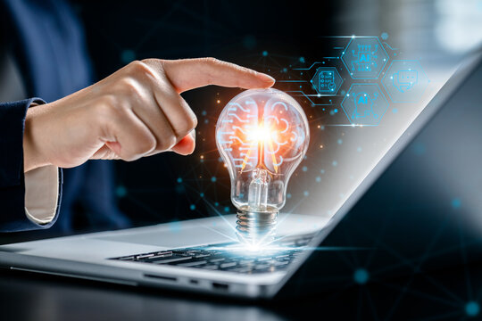 Businesswoman holding light bulbs with Brain inside and circuit board line background, creative and innovative inspiration, artificial, technology, intelligence digital. business idea strategy concept