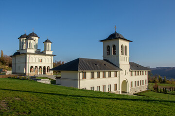 Fototapeta na wymiar New Orthodox monastery of nuns from Salva, Built in 1994,Bistrița.Romania Image of October 2022