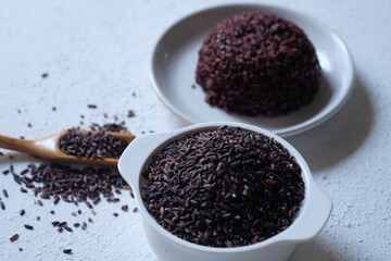 black rice and rice. also known as purple rice. Oryza sativa L. indica. staple food. carbohydrate. beras hitam.