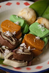 Gethuk Getuk Lindri is a snack made with the main ingredient of cassava which is sweetened with sugar or palm sugar, is a food that is easily found in Central Java. Grated coconut. Indonesian food. 