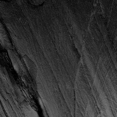 Dark grey black slate background or texture.