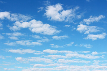 Blank sky surface with small clouds