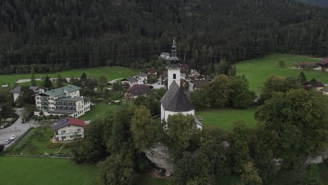 Orbit shot of the Wallfahrtskirche St. Nikolaus Golling, aerial 4k