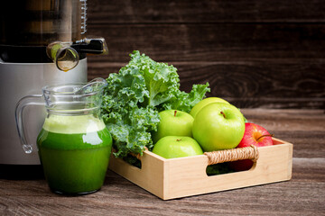 apples and bottle of smoothie juice
