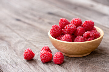 raspberries on wooden table