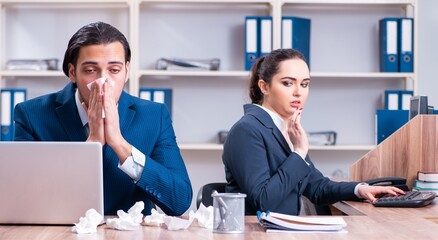 Two employees suffering at workplace
