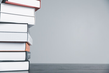 Book stack in the library room and blurred stack book for business and education background, back...