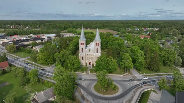 Rotating right aerial of Rapla Maarja-Magdaleena Church which is the only rural church with two towers in Estonia.