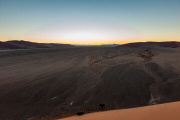 Fototapeta na wymiar Exterior shot of the Namibian Sossusvlei sanddunes near the famous Dune 45 around sunrise