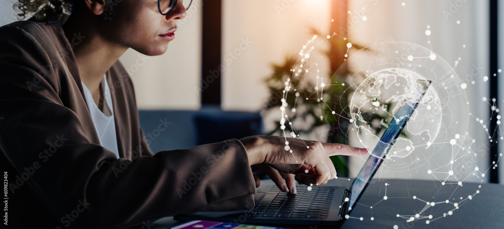 Aufkleber Black woman working in office and communication network concept. ICT (Information Communication Technology). Cloud computing. System engineering.
