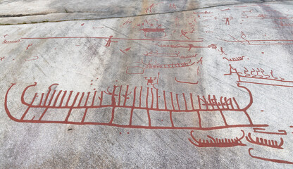 Ancient rock art carvings of large ship in Tanum, Sweden