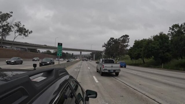 Sport utility vehicle in the high-occupancy vehicle lane on the I-405 in Los Angeles, California - hyper lapse