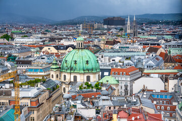 Obraz premium Aerial view of Vienna central buildings on a cloudy summer day, Austria