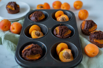 sweet home made chocolate muffins with apricot