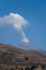 Landscape of volcano smoke. Colca, Peu