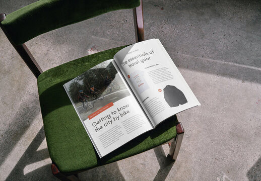 Mockup of open A4 magazine with customizable content on chair