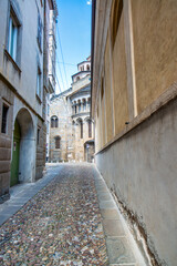 Medieval streets and buildings of Bergamo Alta on a sunny summer day, Italy