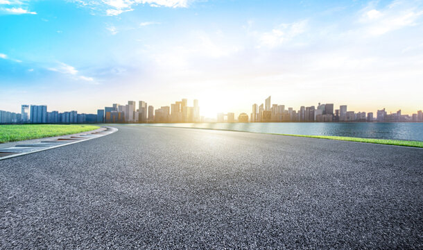 Empty road floor surface with modern city landmark buildings of hangzhou bund Skyline,zhejiang,china