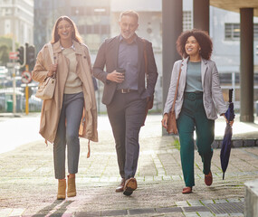 Business people in city, walking and travel with commute to work, happy corporate group with journey and outdoor. Professional, businessman and women walk in street with employees traveling together