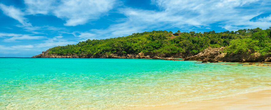 Stunning Beautiful Sea Landscape Beach With Turquoise Water. Beautiful Sand Beach With Turquoise Water. Beautiful Tropical Beach With Blue Sky And White Clouds.