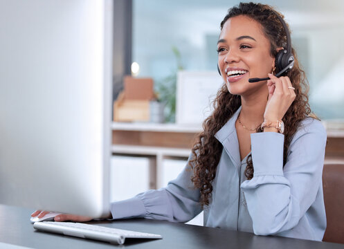 Customer service, computer and a woman consulting in her office for telemarketing, sales or assistance. Call center, support and crm with a happy young female employee working online using a headset