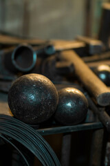 Metal balls on the table in the workshop 