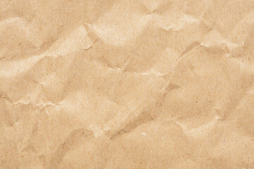 Abstract crumpled and creased recycle brown paper texture background