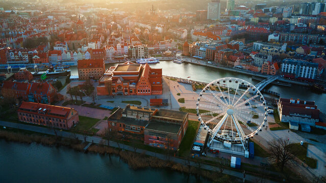 Aerial View Of Ferris Wheel Attraction In Gdansk City, Poland. Panoramic View Of Touristic Place In European City